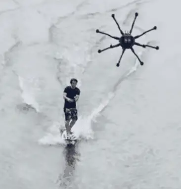 man drone surfing