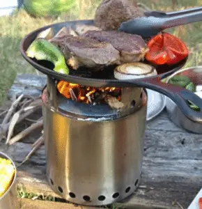 cooking steak on wood gas stove