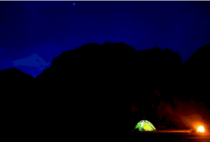 lit tent night camping