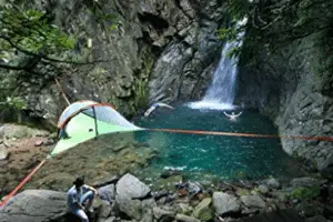 three swimmers waterfall hanging tent site
