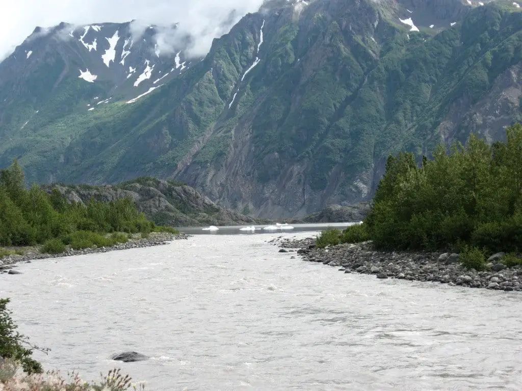 glacier river under Alaska mountain