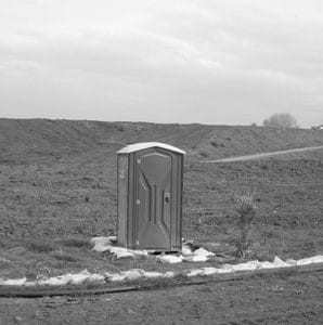 green latrine open field