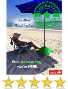 sun bather under beach umbrella