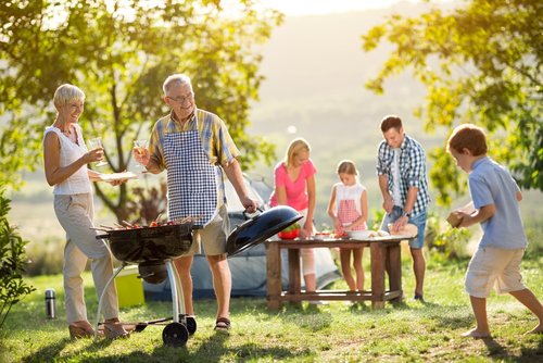 outdoor family picnic while camping