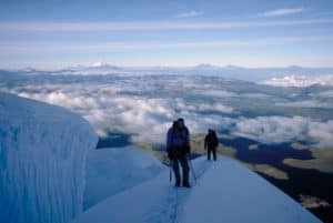 two trekkers in the snow