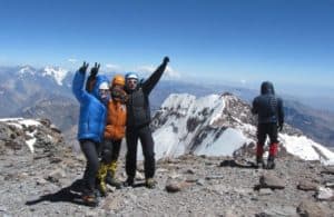 four climbers on Argentine mountain top