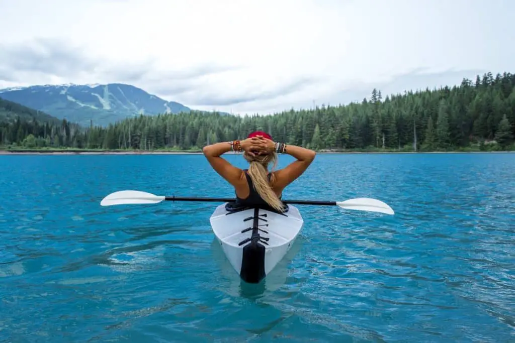 woman kayaking on the lake
